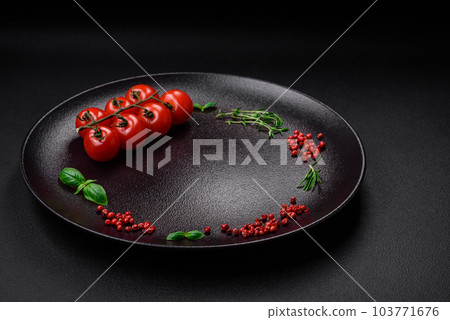 Ingredients for cooking cherry tomatoes, salt, spices and herbs Ingredients for cooking cherry tomatoes, salt, spices and herbs 103771676