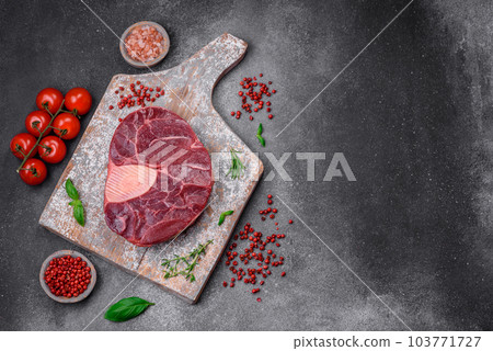 Fresh beef ossobuco steak with salt, spices and herbs 103771727