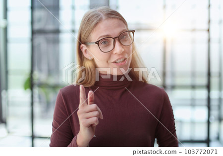 young business lady in glasses is thinking about something 103772071