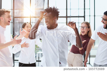 Happy group of business team celebrating a good job in the office 103772089