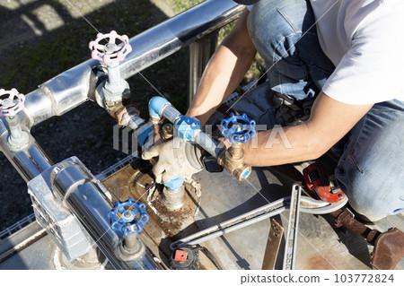 Piping work around the water receiving tank 103772824