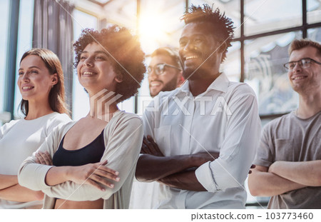 Smiling professional business leaders and employees group team portrait Smiling professional business leaders and employees group team portrait 103773460