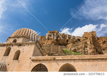 Turkey The Grand Mosque in the old town of Mardin and Mardin Castle on the mountain top Turkey The Grand Mosque in the old town of Mardin and Mardin Castle on the mountain top 103776613