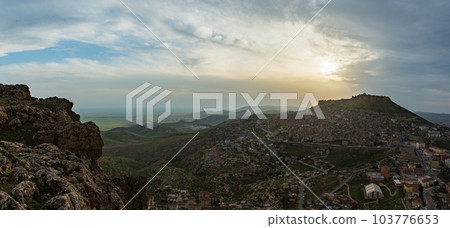 Turkey The cityscape of the old town of Mardin seen from the hill, Mardin castle standing on the mountaintop and the sunset sky Turkey The cityscape of the old town of Mardin seen from the hill, Mardin castle standing on the mountaintop and the sunset sky 103776653