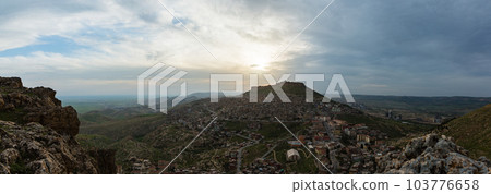 Turkey The cityscape of the old town of Mardin seen from the hill, Mardin castle standing on the mountaintop and the sunset sky Turkey The cityscape of the old town of Mardin seen from the hill, Mardin castle standing on the mountaintop and the sunset sky 103776658