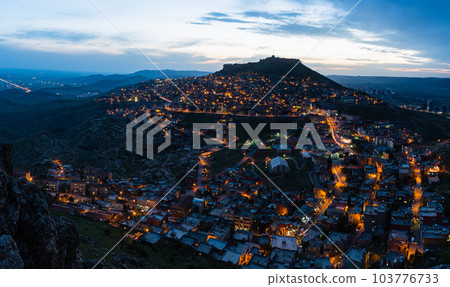 Turkey Night view of the illuminated old town of Mardin and Mardin Castle on the top of the mountain Turkey Night view of the illuminated old town of Mardin and Mardin Castle on the top of the mountain 103776733