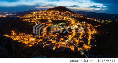 Turkey Night view of the illuminated old town of Mardin and Mardin Castle on the top of the mountain 103776751