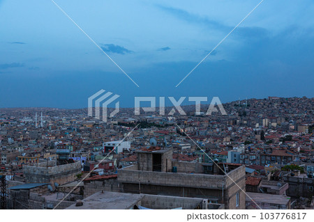 Townscape at dusk seen from the hills of the old town of Gaziantep, Turkey 103776817