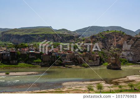 El Rudzuq Camii in Hasankeyf, Turkey and the Hasankeyf Bridge over the Tigris River 103776983