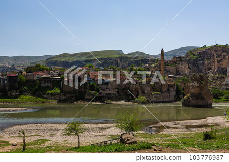 El Rudzuq Camii in Hasankeyf, Turkey and the Hasankeyf Bridge over the Tigris River 103776987