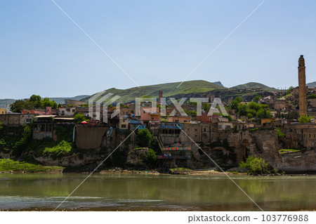 El Rudzuq Camii in Hasankeyf, Turkey and the Hasankeyf Bridge over the Tigris River El Rudzuq Camii in Hasankeyf, Turkey and the Hasankeyf Bridge over the Tigris River 103776988