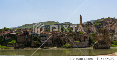 El Rudzuq Camii in Hasankeyf, Turkey and the Hasankeyf Bridge over the Tigris River El Rudzuq Camii in Hasankeyf, Turkey and the Hasankeyf Bridge over the Tigris River 103776989