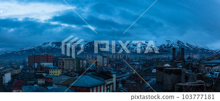 The cityscape, Chifte Minare and Palandken Mountain seen from Erzurum Castle in Erzurum, Turkey The cityscape, Chifte Minare and Palandken Mountain seen from Erzurum Castle in Erzurum, Turkey 103777181