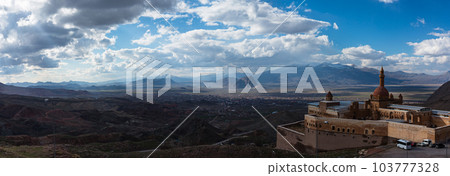 Turkey Isaac Pasha's Palace on the hillside and the city of Dogubeyazit and the mountains beyond 103777328