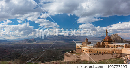 Turkey Isaac Pasha's Palace on the hillside and the city of Dogubeyazit and the mountains beyond 103777395