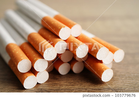 Cigarette, roll tobacco in paper with filter tube, No smoking concept. 103779676