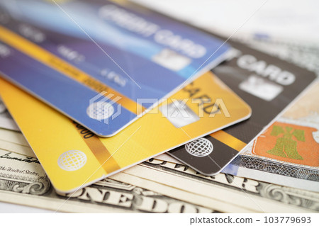 Credit card with password key lock and US dollar banknote money, security finance business concept. 103779693