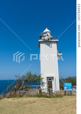 Blue sky in early spring and the scenery of Kasamisaki Lighthouse standing on Kasano Cape | Image of Kaga City | Image of lighthouse | Kaga City, Ishikawa Prefecture 103784915