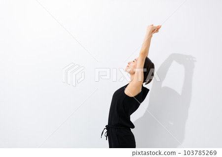 Woman stretching sunshine 103785269