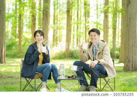 photo of people drinking coffee outdoors 103785285