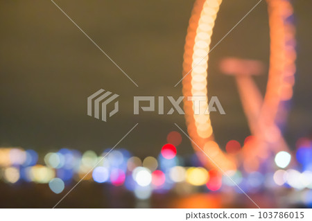 Blurred image of Ferris Wheel, Bokeh background Blurred image of Ferris Wheel, Bokeh background 103786015
