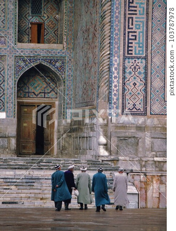 Uzbekistan Samarkand Muslims entering Sherdol Madrasah 103787978