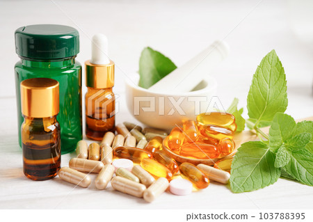 Alternative medicine herbal organic capsule with vitamin E omega 3 fish oil, mineral, drug with herbs leaf natural supplements for healthy good life.. 103788395