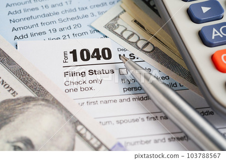 Tax form 1040 U.S. Individual Income Tax Return, business finance concept. Tax form 1040 U.S. Individual Income Tax Return, business finance concept. 103788567