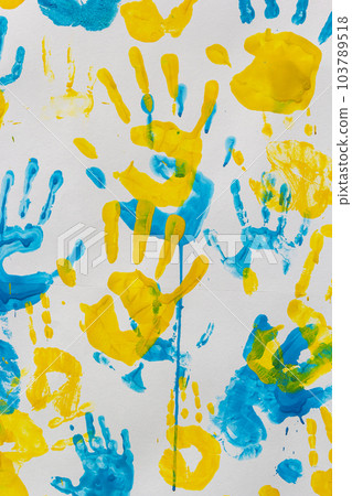 bright prints of children's hands from paint on the wall, background, texture bright prints of children's hands from paint on the wall, background, texture 103789518