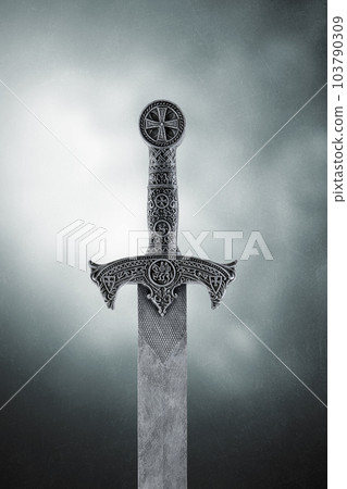 Medieval sword over dark misty background  103790309