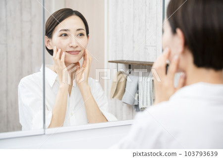 Beauty image of a young woman doing skin care 103793639