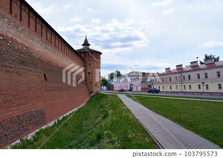 Kolomna, Russia - May 30, 2023: Street with a fortress wall in Kolomna city. Ancient Russian architecture Kolomna, Russia - May 30, 2023: Street with a fortress wall in Kolomna city. Ancient Russian architecture 103795573