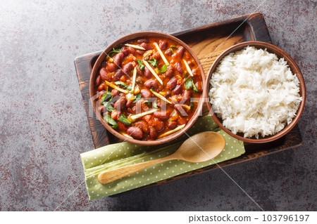 Rajma Chawal is a popular North Indian Food made of Red kidney beans cooked with onions, tomatoes and a special blend of spices, served with Rice close-up. Horizontal top view 103796197