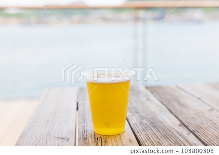 Draft beer on the beach 103800303