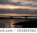 The silhouette of the bridge floating in the sunset 103802562