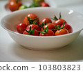 Fresh cherry tomatoes from the kitchen garden 103803823
