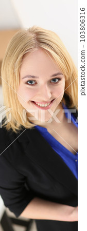 Beautiful smiling business woman holding smartphone concept Beautiful smiling business woman holding smartphone concept 103806316