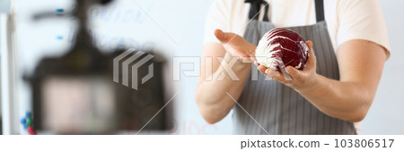 Chef blogger broadcasts on camera and talks about healthy eating 103806517