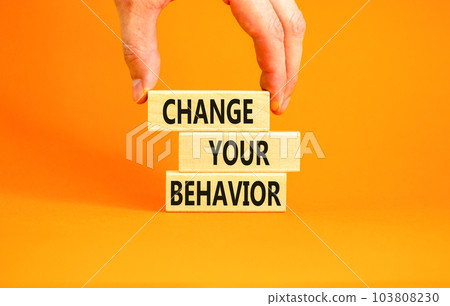 Motivation and Change your behavior symbol. Concept words Change your behavior on wooden block on a beautiful orange table orange background. Business change your behavior concept. Copy space. Motivation and Change your behavior symbol. Concept words Change your behavior on wooden block on a beautiful orange table orange background. Business change your behavior concept. Copy space. 103808230