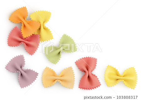 colorful farfalle pasta isolated on white background . Top view with copy space for your text. Flat lay. colorful farfalle pasta isolated on white background . Top view with copy space for your text. Flat lay. 103808317