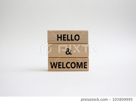 Hello and Welcome symbol. Concept words Hello and Welcome on wooden blocks. Beautiful white background. Business and Hello and Welcome concept. Copy space. Hello and Welcome symbol. Concept words Hello and Welcome on wooden blocks. Beautiful white background. Business and Hello and Welcome concept. Copy space. 103809995