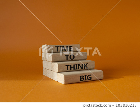 Time to think big symbol. Wooden blocks with words Time to think big. Beautiful orange background. Business and Time to think big concept. Copy space. Time to think big symbol. Wooden blocks with words Time to think big. Beautiful orange background. Business and Time to think big concept. Copy space. 103810215