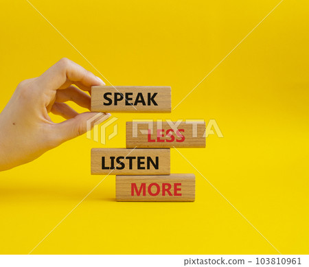 Speak less Listen more symbol. Wooden blocks with words Speak less Listen more. Beautiful yellow background. Businessman hand. Business and Speak less Listen more concept. Copy space. Speak less Listen more symbol. Wooden blocks with words Speak less Listen more. Beautiful yellow background. Businessman hand. Business and Speak less Listen more concept. Copy space. 103810961