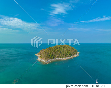 aerial panorama view above turquoise sea around Nui beach small beach surrounded by tourist attractions. Nui beach is the good place for swimming snorkeling and sea canoe. turquoise sea background. aerial panorama view above turquoise sea around Nui beach small beach surrounded by tourist attractions. Nui beach is the good place for swimming snorkeling and sea canoe. turquoise sea background. 103817099