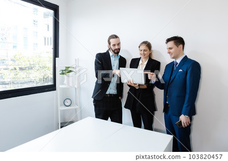 Group of business people using laptop brainstorming meeting teamwork. Group of business people using laptop brainstorming meeting teamwork. 103820457