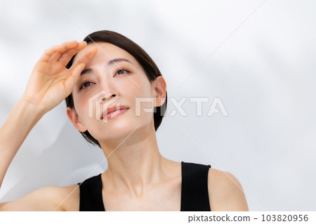 Woman portrait sunshine ultraviolet rays summer 103820956