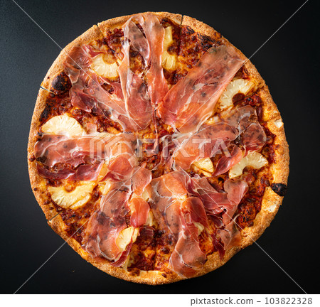 Pizza with prosciutto or parma ham pizza 103822328
