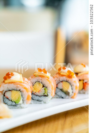 salmon roll sushi with cheese on top salmon roll sushi with cheese on top 103822562