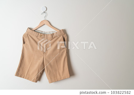 short pants hanging on wall short pants hanging on wall 103822582