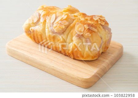 taro toast bread on wood board 103822958